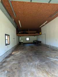 20x44 Shop with 12ft door. Gas and Water Stubbed out in this building, duct work ran but gas unit needs replacing to this shop.  220 plug in this shop