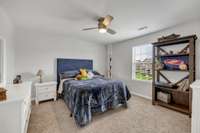 Bedroom #2 has a Ceiling Fan and Walk-In Closet