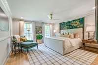 Inviting primary bedroom suite adorned with upscale finishes, thoughtfully designed for ultimate comfort and everyday luxury.