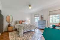 Another 2nd floor bedroom. Designed with recessed desk/workspace area.
