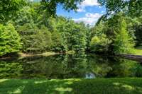 Your own private, serene 1/2 acre pond. Kids love riding in the paddle boat and canoes, and of course they love to fish!