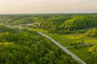 Views of the iconic double arch Natchez Trace Bridge, with incredible opportunities to explore via horseback, mountain bike or motorcycle!