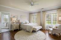 4 large bedrooms upstairs, all with en suite bathrooms, and each showcasing the gorgeous sunset views setting behind the beautiful rolling hilltops surrounding the home