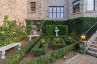 Formal English Gardens welcome you home, and a courtyard parterre designed by the lead British gardener from Oscar de La Renta's estate transport you to a European Manor