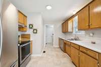 Stainless steel appliances, including the refrigerator, stove, and microwave, all convey with the home. 3114 Penny Ln Murfreesboro, TN 37130