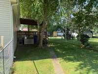 Another view of the covered deck from the right side of the property