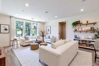 Upstairs Bonus Room/Living Room. This photo has been virtually staged.