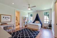 Upstairs Bedroom Three. This photo has been virtually staged.