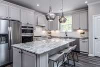 Quartz countertops are included in all of our homes!