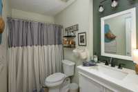 Your second full bath snuggled perfectly between your two secondary bedrooms, yet, centrally located enough from your greatroom that its fully accessible for guests