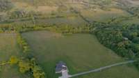 rear 5.49 acreage bordered by the creek and one solitary neighbor