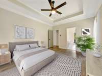 Virtually staged primary bedroom