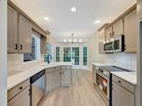 Updated kitchen with all new stainless steel appliances, new countertops, and new backsplash