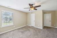 Bedroom #4 is the only on the 2nd level, has a walk-in closet and private access to the full bath.