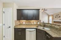 It opens nicely to the breakfast and living rooms making it great for entertaining or just watching your favorite show while preparing your favorite meal.