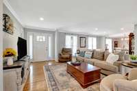 Large and inviting living room with loads of natural light