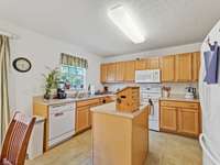 Ample cabinetry makes this kitchen a great place for the cook.