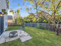 Another view of the fully fenced back yard. This home backs to green space and is on a dead end street providing sought after privacy.