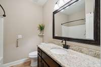 Hallway bath between two bedrooms.