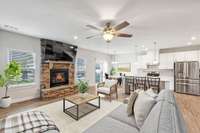 Living Room open to Kitchen and Dining area (virtually staged)