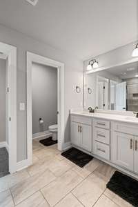 The full bathroom upstairs also has double sinks, separate water closet
