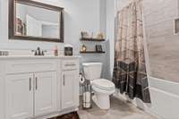 And the full bath just outside the guest bedroom.