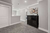 At the top of the stairs is a great landing area for playing, relaxing or working!