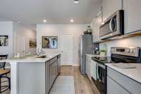 Model home images - this community does have a gas range