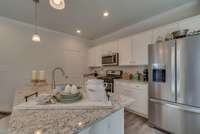 Photos are from a previous Penwell model home - not all finishes are the same or available