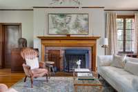 Living room with wood burning fireplace