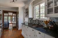View from walking in to the kitchen from the Butler's Pantry. The kitchen and lounge has beautiful copper sinks.
