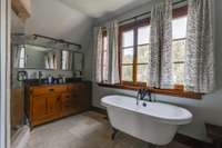 Primary bedroom bath room with Shower and tub.