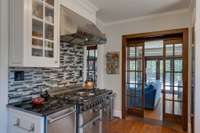 Smart and Beautiful Remodeled Kitchen & Lounge, equipped with AGA Stove, Subzero Refrigerator, plus a Bosch dishwasher. Granite Countertops The kitchen extends into the lounge.