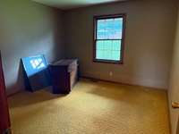 The first of the three bedrooms.