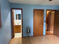 The third bedroom has a half bath.