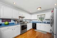 Lots of cabinets in the Kitchen.