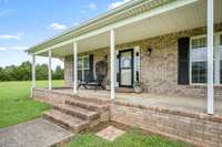 Nice covered front porch for sitting.