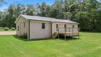 New metal roof, new gutters, new deck, new windows, new exterior paint.