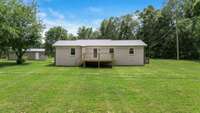 20x30 detached garage, level, expansive yard.