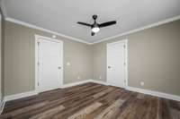 Another look at the primary bedroom. 13x12 in size. Fresh, neutral paint and new interior doors.