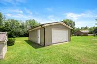 The detached garage with side pedestrian door.