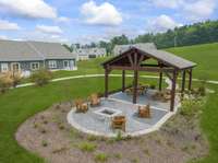 Another look at the community Pavilion and Firepit. Great space to enjoy with your family and Friends.