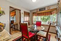 Dining room w/bay window and window seat.