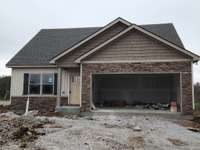 Lot 110 Valley Farms will have Decorative Stacked Stone on the Front.  Previous Home is pictured.