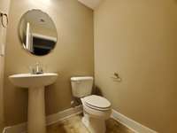 There is a Half Bath located on the Main Level for Guests.   Picture of Similar Home