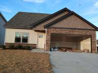 House has 2 Car Garage and Double wide Driveway. Picture of Previous House.