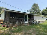 Fully enclosed screened porch--attached to primary bedroom