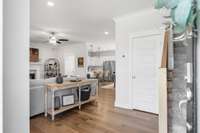 Come on inside and take a look!  Gleaming wood flooring greets you at the front door.