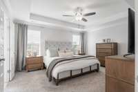 The Owner's Suite has a walk-in closet, trey ceiling and full bath.  Remember, this is better than new, the drapes and blinds are already in place.