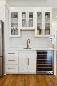 Oh, look here!  A wine/beverage container, with it's on sink!